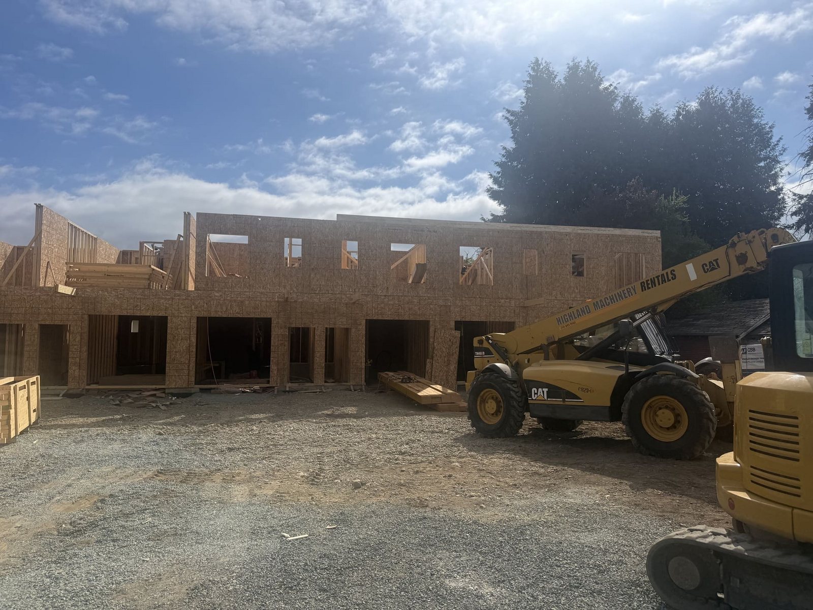 Townhouse structural framing progress, view 1